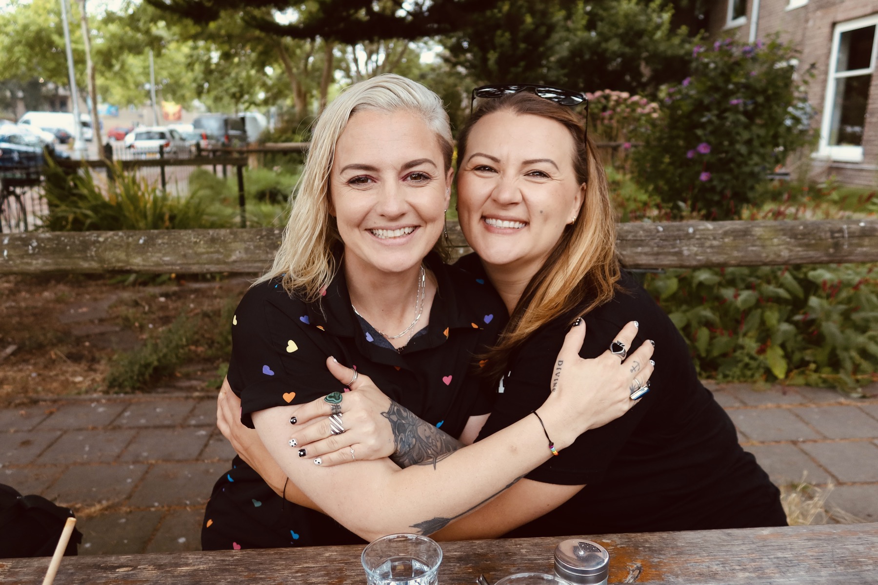 Two Amistara friends embracing
